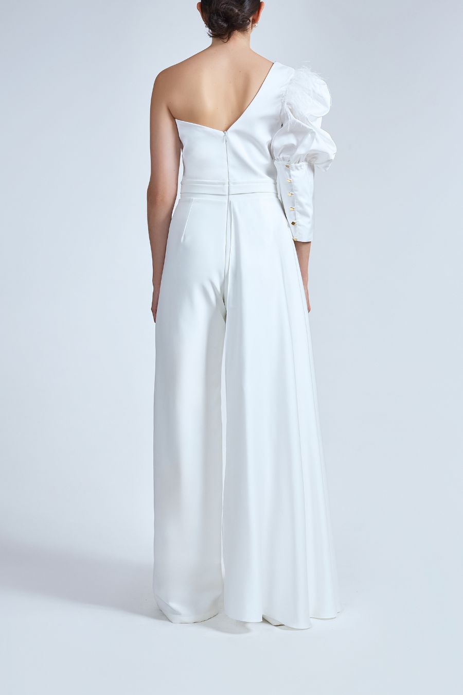 JUMPSUIT ASIMETRICO CON SOBREFALDA